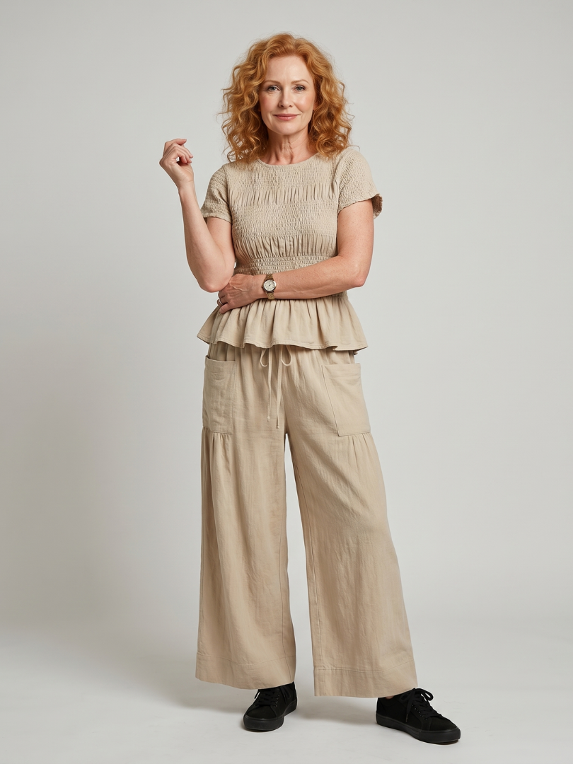 Eirenne | Peplum Detail Smocked Top And Wide Leg Pants Set