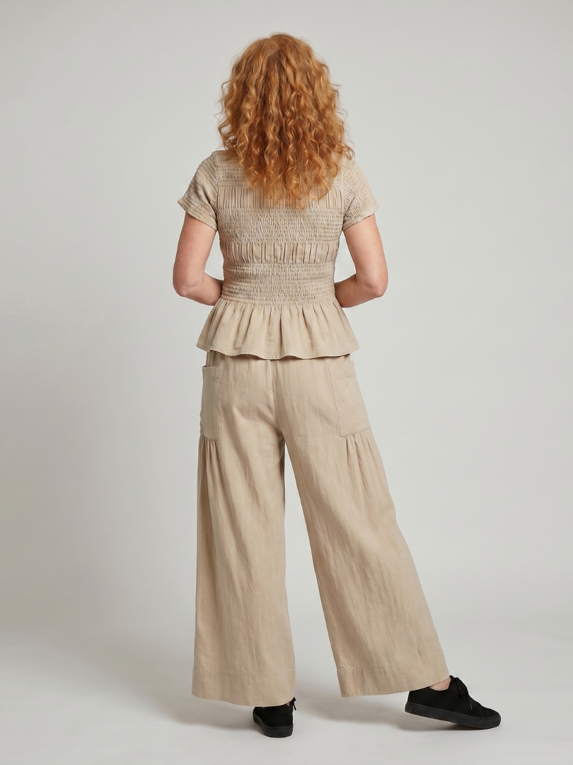 Eirenne | Peplum Detail Smocked Top And Wide Leg Pants Set