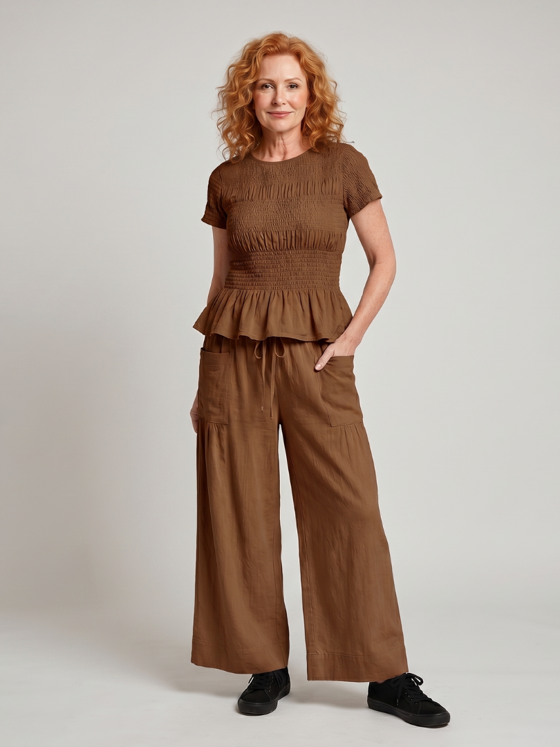Eirenne | Peplum Detail Smocked Top And Wide Leg Pants Set